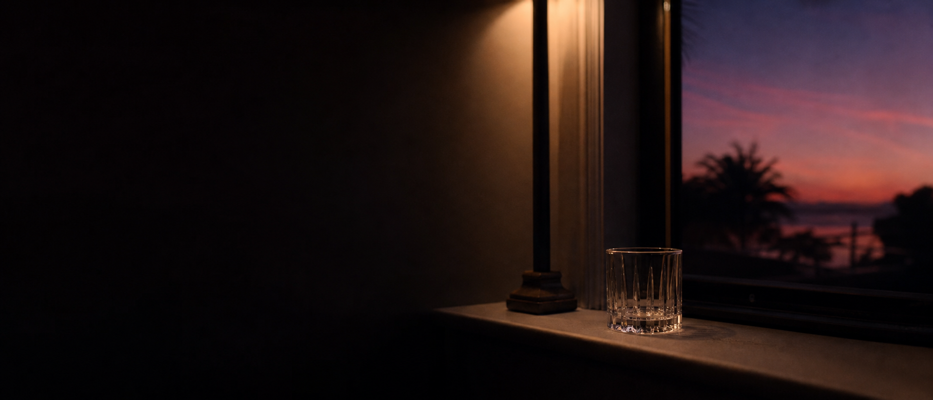 Dusk · The day lets go. The first glass says so.